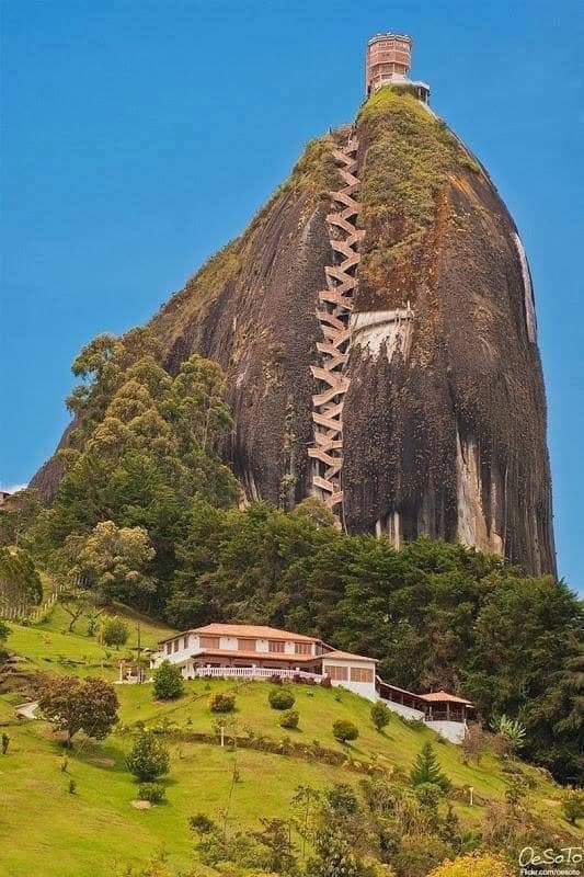 The colorful rock of El Penol in Guatape with stairs leading to the top
